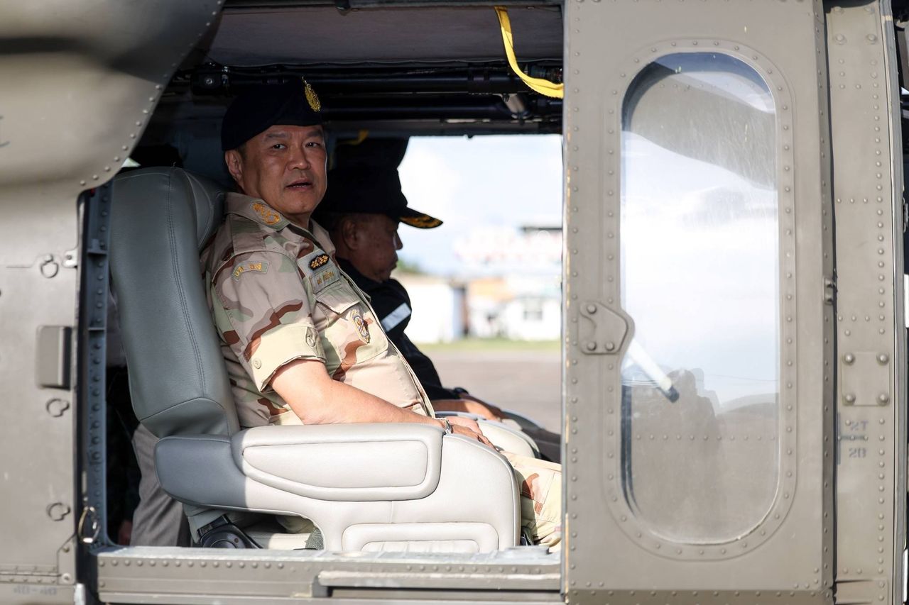 “阿努廷”访问会合－塔玛丽亚基地及攀登丘珍山 在看望触雷士兵之前